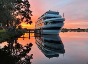 Sir Winston in the water at sunset