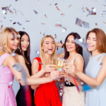 group of young women toasting at bachelorette party